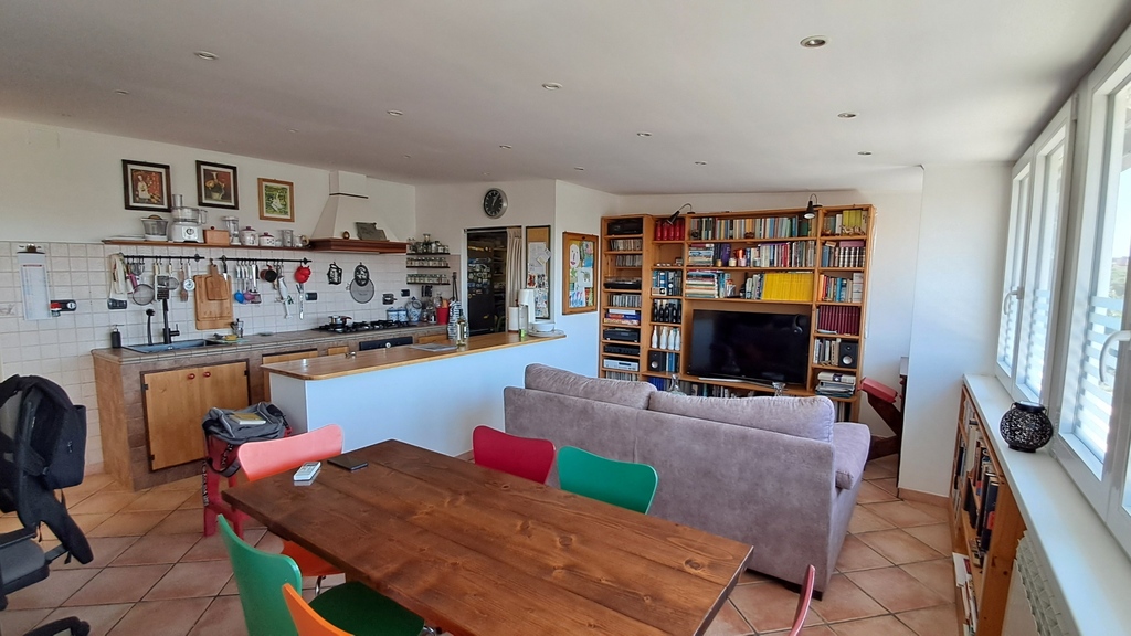 My sunnly dining room: sofa, tv set, kitchen coin...what else?