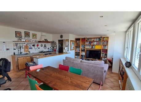 My sunnly dining room: sofa, tv set, kitchen coin...what else?