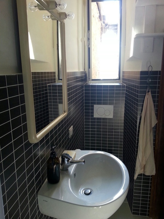 Smaller bathroom with shower
