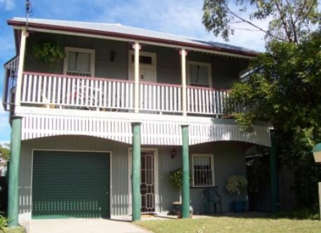 Our home on the top of the hill - a 'Queenslander' style house