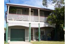 Our home on the top of the hill - a 'Queenslander' style house