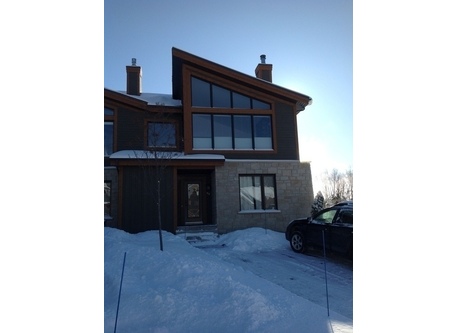 Jumelé avec 5 chambres avec magnifique vue sur le mont Ste-Anne