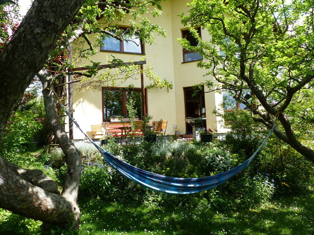 Relaxing under the apple trees or at the terrace