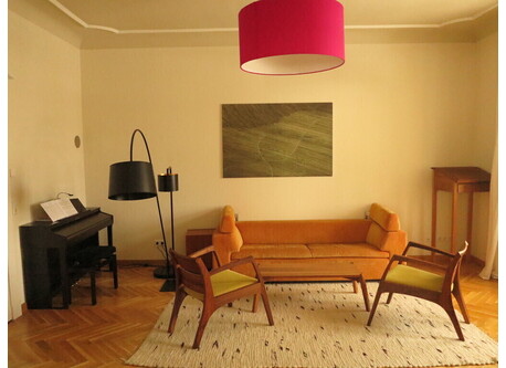 sitting room with piano