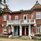 Edwardian terrace with communal front garden.