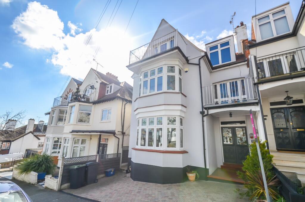House from the front street - one off road parking space and reserved road space.