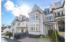 House from the front street - one off road parking space and reserved road space.