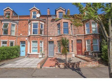 Our house is the one with the grey door