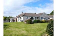 Front garden (one of 4 gardens) + front of house.