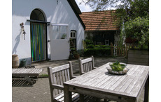Ons boerderijtje uit 1876. Het tiny house bevindt zich in de voormalige deel.