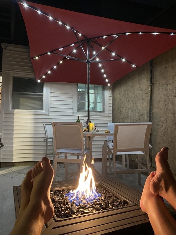 Enjoying the gas fire pit in our backyard 