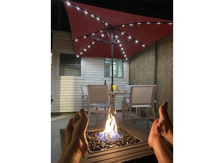 Enjoying the gas fire pit in our backyard 