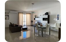 Spacious living room with balcony
