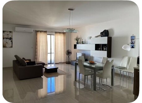 Spacious living room with balcony