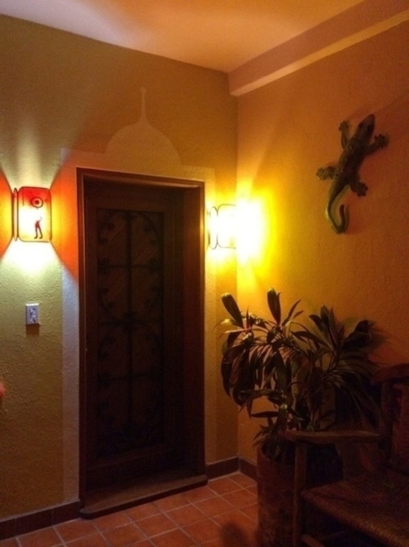 Ronda's fused glass art adorns the entrance terrace.