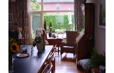 Living room - back., with view onto our small, sunny garden, looking south, next to the house. 