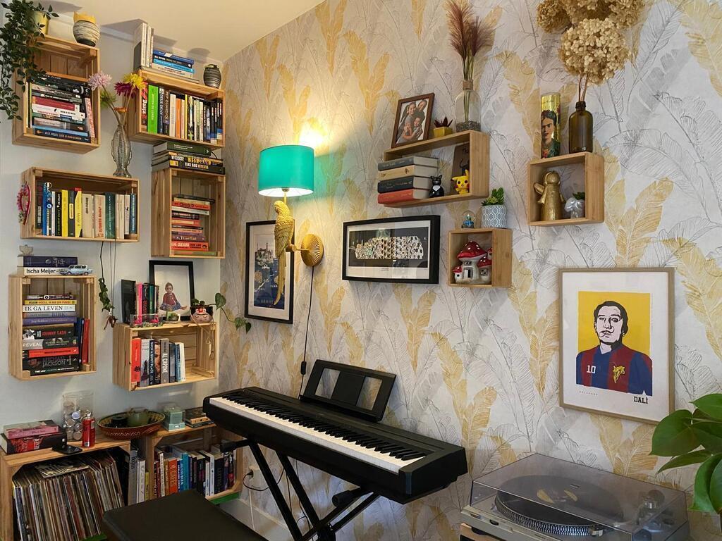 Other side of the living room with electric piano.