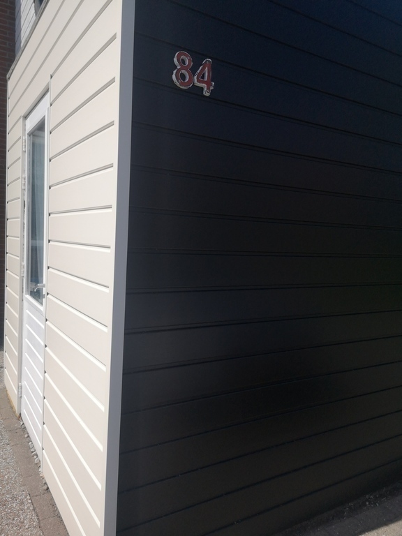 Front, with renewed barn