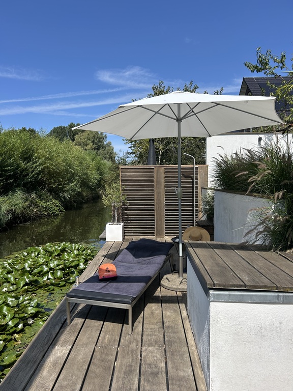 Sunbed on deck for you to enjoy - we also have an outside shower.