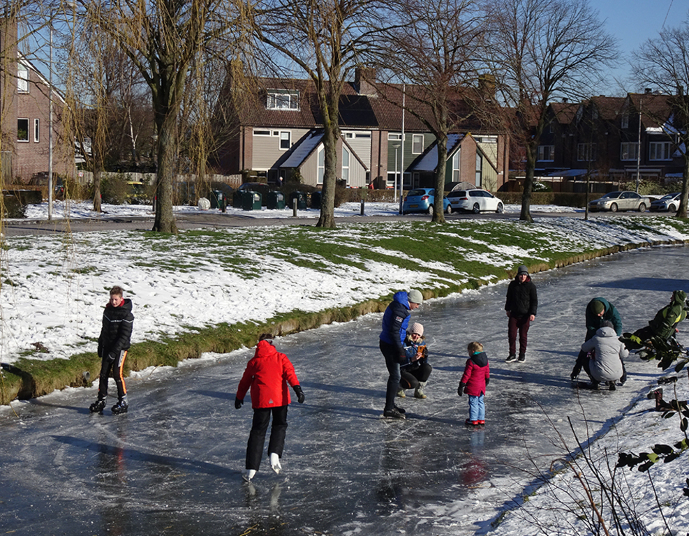 Ice skating in front of our house.