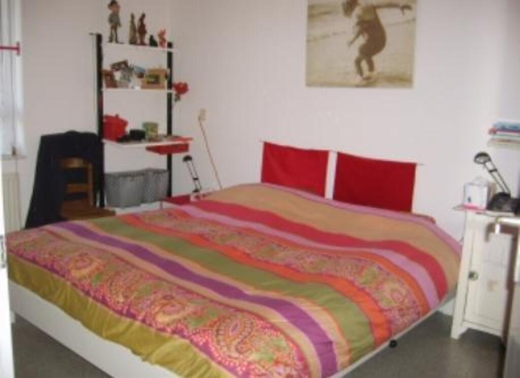 the bedroom with a kingsize (or is it queensize?) bed