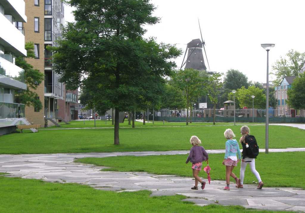 The "green" Funenparc. In the background corn-mill "De Gooyer".