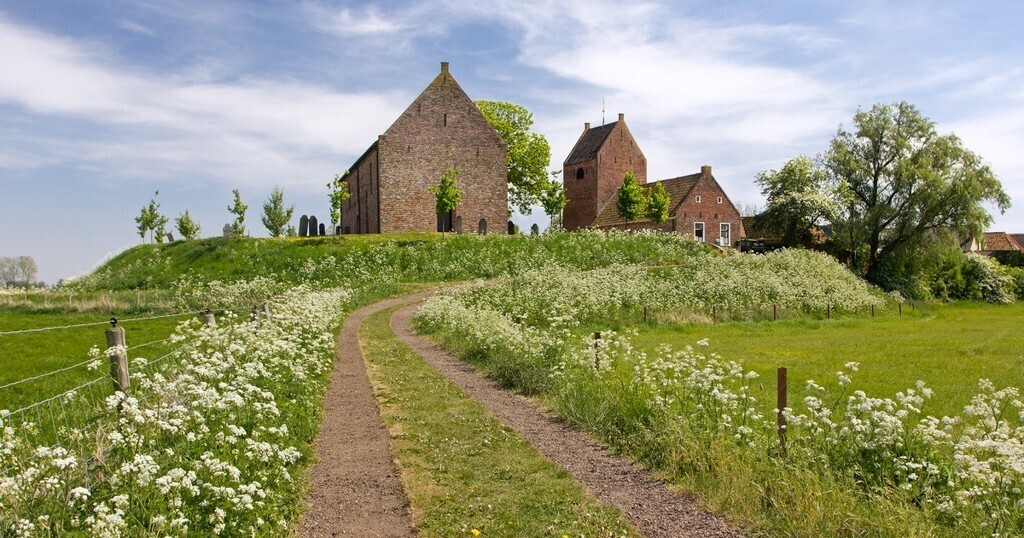Old church on a "wierde", a typical landscape in Groningen