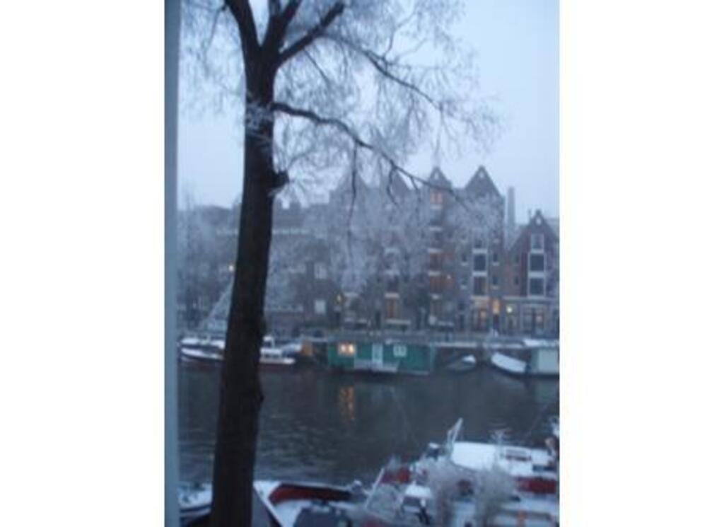 The canals (old center of Amsterdam), 15 minutes by public transport  tram