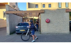 The back of our house. Jilles is going to school.