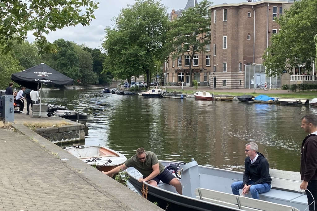 rent a boat opposite the house at mokumbootverhuur.nl/en/home; choose location east