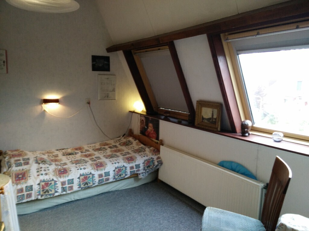 Bedroom with lots of boardgames, puzzles,  playmobil etc