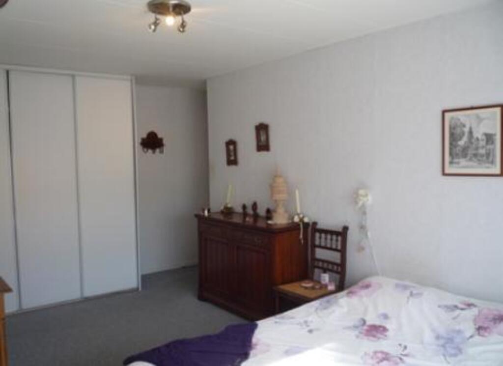 The parents bedroom is big and comfortable.