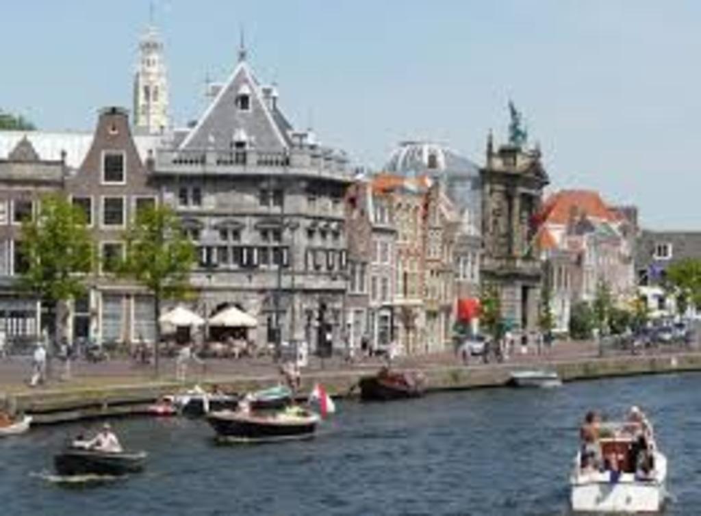 The river Spaarne in the centre of Haarlem and Teylers Museum
