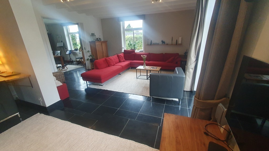 Living room and en-suite dining room (on the left)