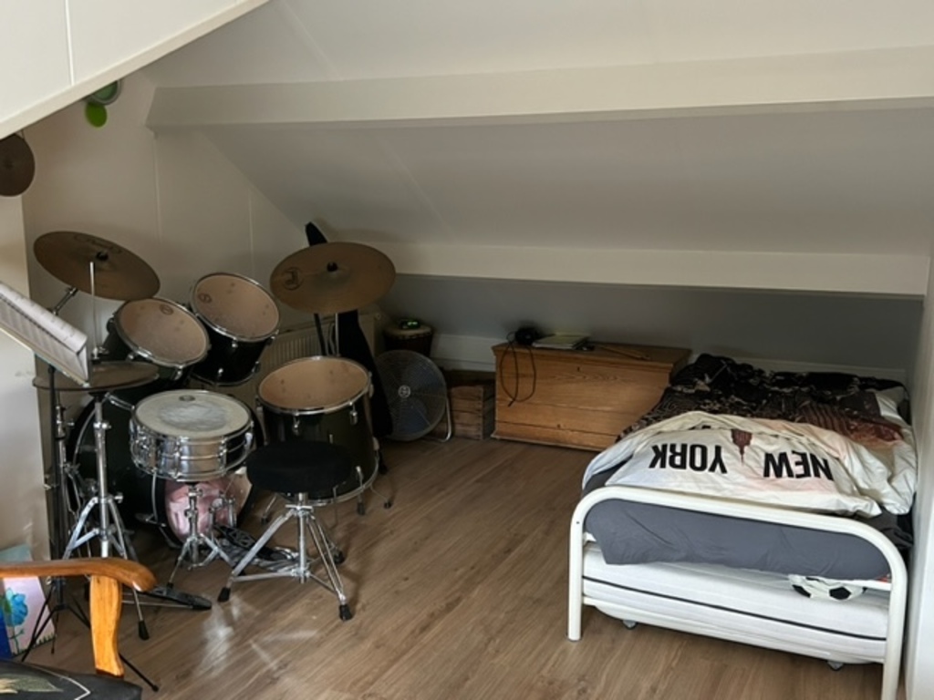 Large 5th bedroom on the 2nd floor with drumset and a lot of lego