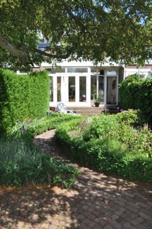 Back at garden with acces to gardenshed and 2 bicycles