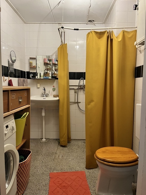 bathroom with washing machine