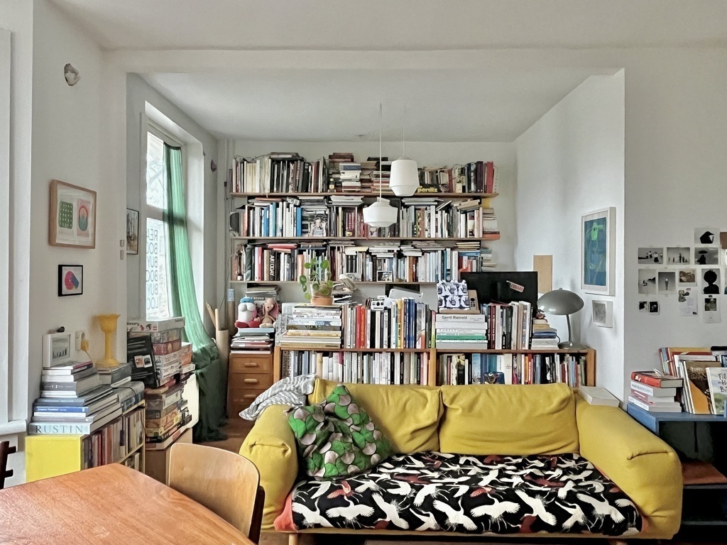 lots of books. side room of our living room is a home office