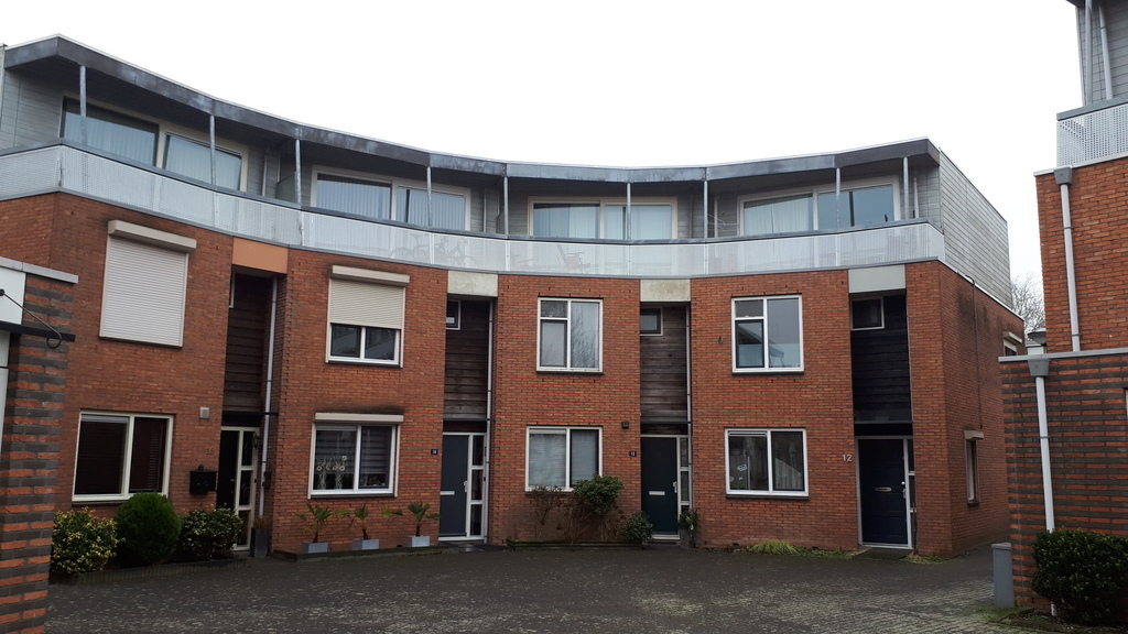 The house on the right is ours. 