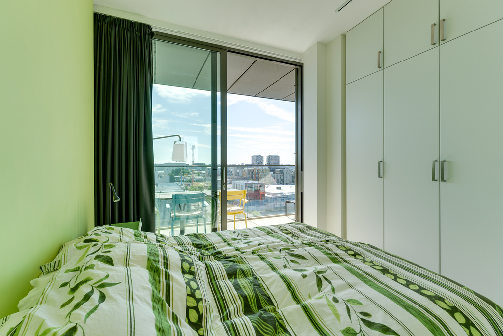 bedroom with access to bathroom
