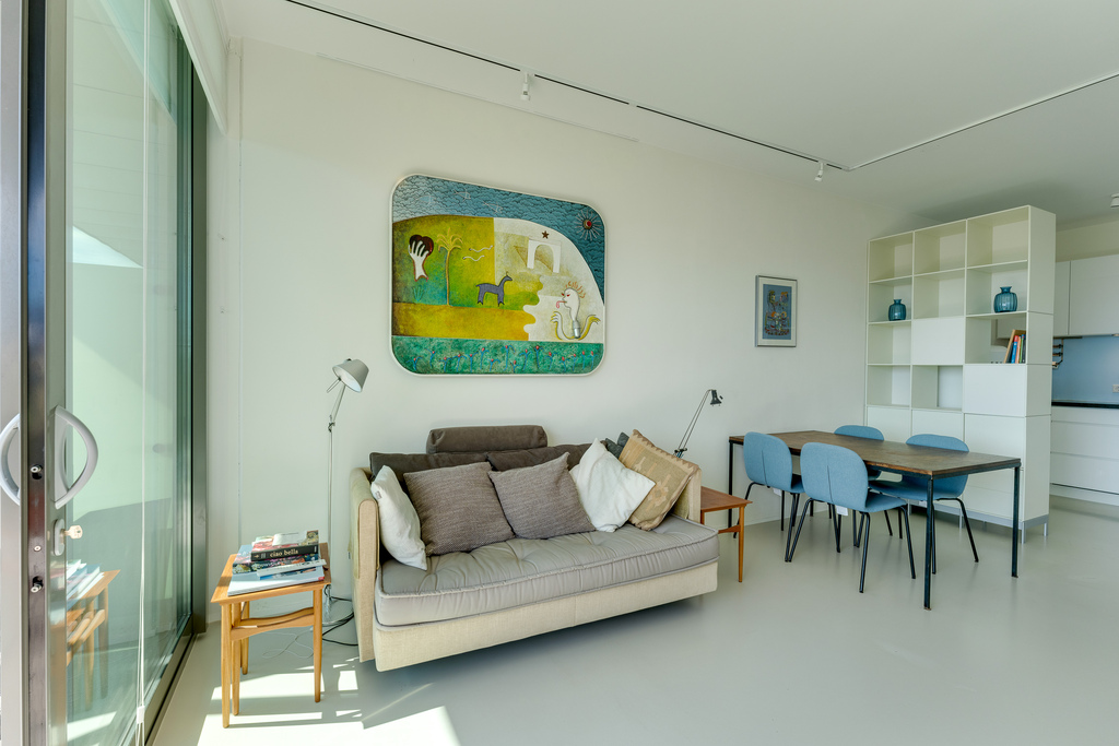 when you come, the living area will have been painted in a different colour.