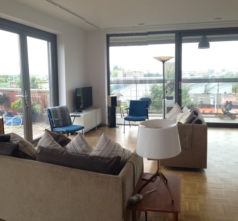 open plan living, door on left gives access to the roof terrace (2nd floor, 54 m2)