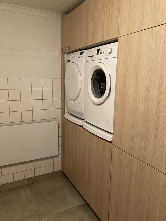 Laundry room with washing machine and dryer
