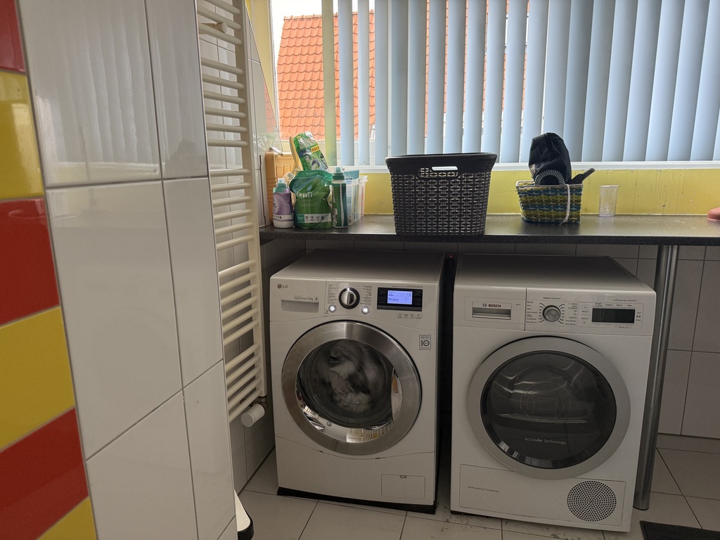 washer and dryer in the second bathroom