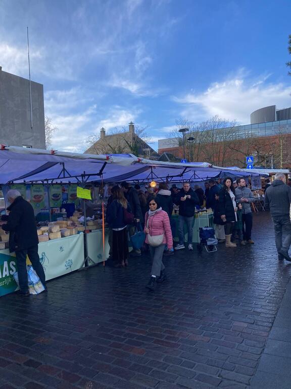 Weekly freshmarket in the centre of Tilburg. On the picture the place for the best cheese ever. 