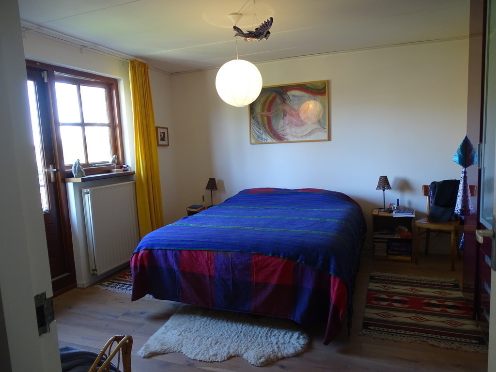 Big bedroom with balcony and airco