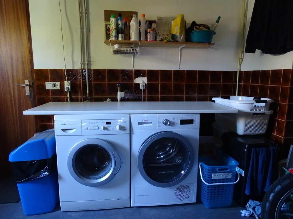 Garage with bikes, washing machine, dryer, etc.