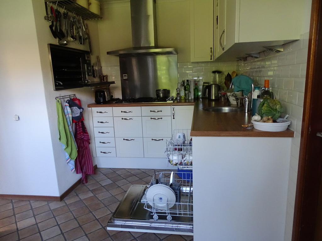 Kitchen with big oven, stove, dishwasher, etc