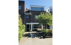 Front view house plus parking space at front door