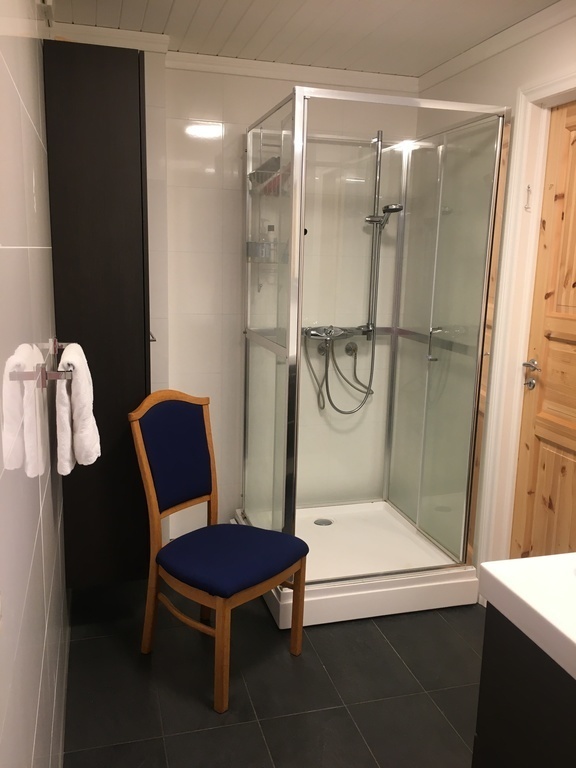 Bathroom downstairs with shower cubicle and heated floor